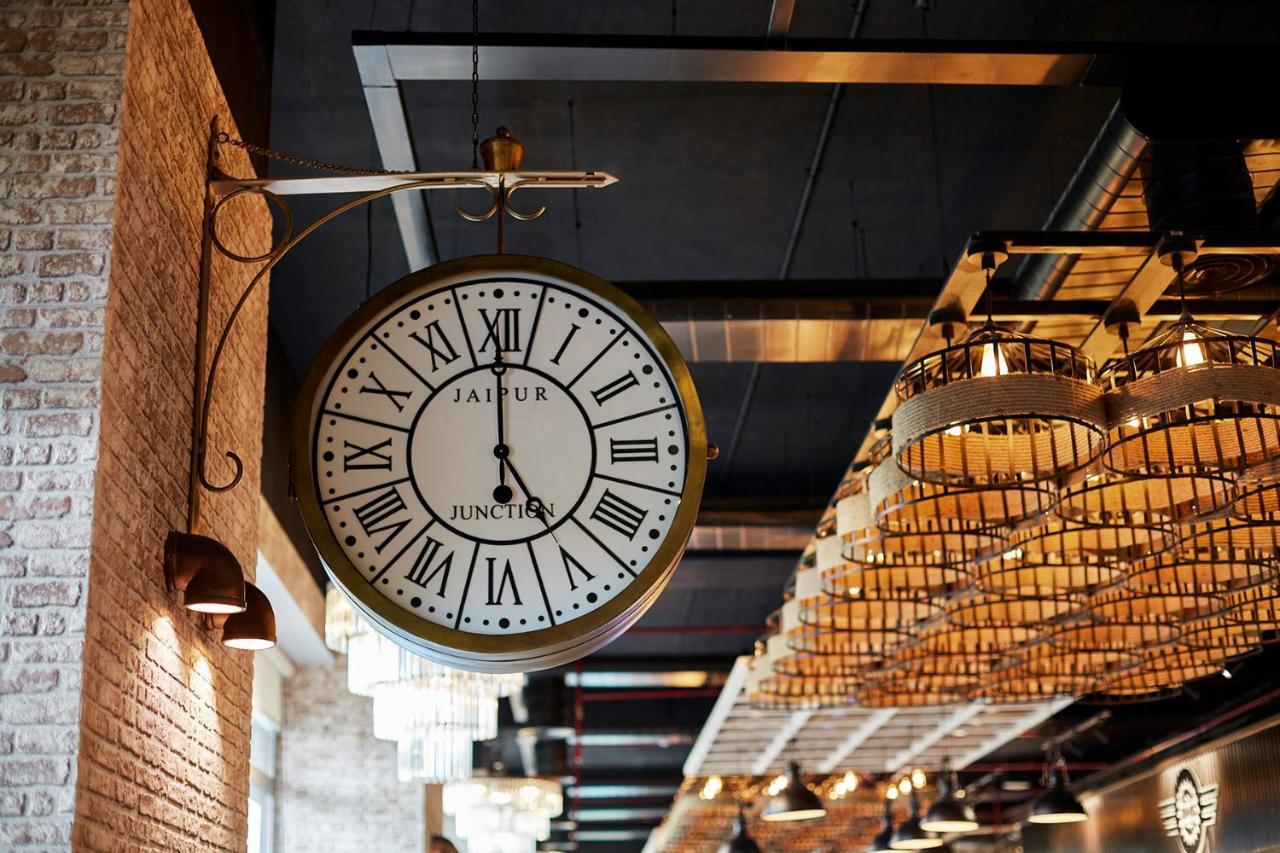Hyatt Place Jaipur Malviya Nagar Kültér fotó The clock at the entrance of the station